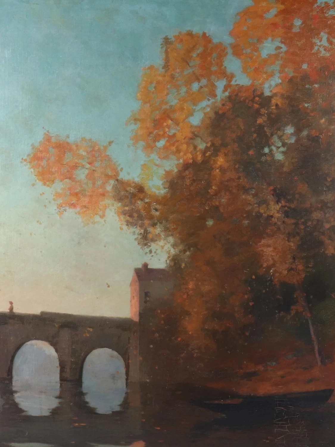 Ponte storico in un paesaggio autunnale